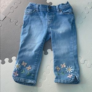Light denim jeans with floral embroidery